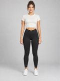 Model styling mockup: black Noelle Namiko Luxe Crossover Leggings, front view.